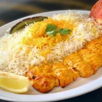 Chicken Kabab · Grilled chicken tender kabab served with grilled tomato and basmati rice.