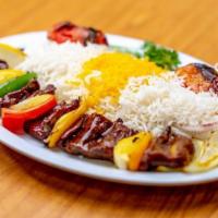 Shish Kabab · Grilled beef chunks kabab served with grilled tomato and basmati rice.