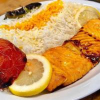 Salmon Kabab · Salmon fish fillet grilled to perfection served with grilled tomato and basmati rice.
