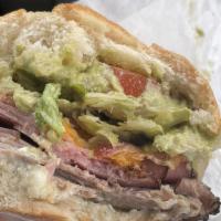 House Club · Mayo, roast beef, pastrami, bacon, cheddar cheese, lettuce, tomato, avocado on a toasted bag...