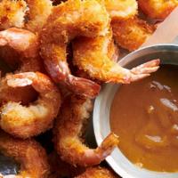 Coconut Shrimp · Jumbo shrimp with korma sauce and coconut.
(Gluten-Free)