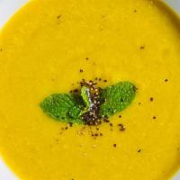 Dal Soup · Lentil soup seasoned with spices and herbs.
(Gluten-Free)