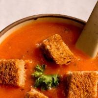 Tomato Soup · Cooked with mild Indian spices and garlic.