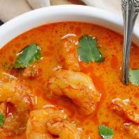 Shrimp Curry · Traditional dish of India carefully seasoned with an exotic blend of curry spices, onion, ga...