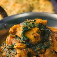 Chicken Saag · Boneless tender meat pieces cooked with chopped spinach and freshly ground spices, garlic, g...