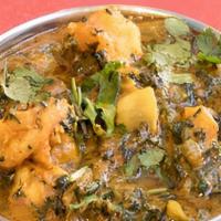 Shrimp Saag · Boneless tender meat pieces cooked with chopped spinach and freshly ground spices, garlic, g...
