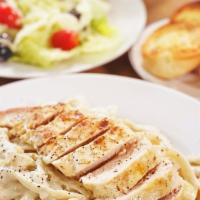 Chicken Fettuccini Alfredo Meal Deal · feeds 4 people   1 and a half pounds of our chicken fettuccini alfredo large ceaser salad an...