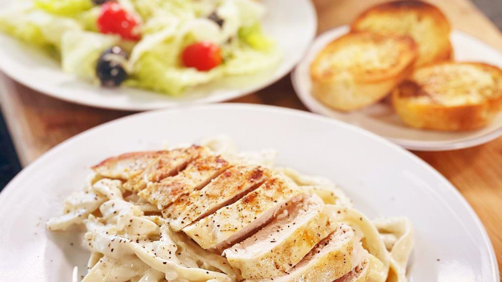 Chicken Fettuccini Alfredo Meal Deal · feeds 4 people   1 and a half pounds of our chicken fettuccini alfredo large ceaser salad and 5 pieces of our garlic toast