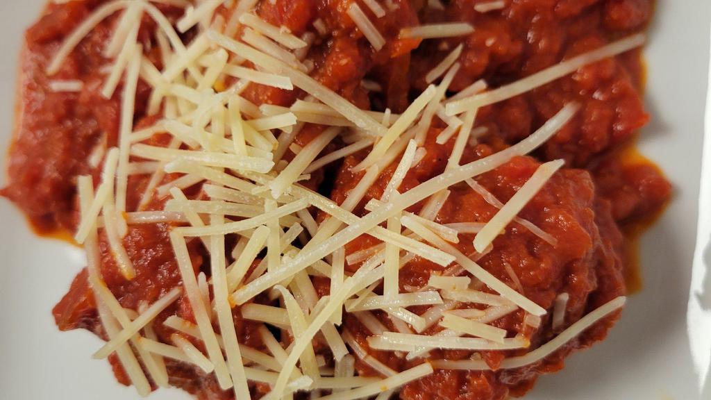 Side Of Meatballs · 3 meatballs and our marinara topped with parmesan cheese
