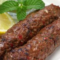 Chicken Seekh Kebab · Served with rice, and chutney.