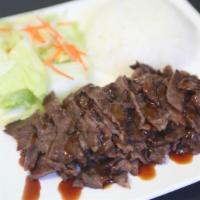 Beef Teriyaki · Served with salad and steamed rice.