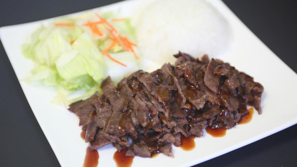 Beef Teriyaki · Served with salad and steamed rice.