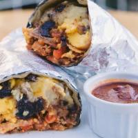 The Arts District · Our egg & cheese breakfast burrito. Wrappin 2 eggs scrambled, melty cheddar cheese, avocado ...
