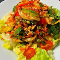 Chicken Salad · Strips of chicken marinated in lime juice, chili, onions, cilantro, carrots, cucumber, tomat...