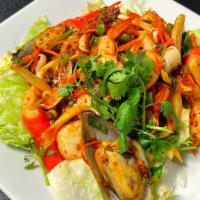 Yum Seafood · Shrimp, mussels, scallop, crab, squid marinated in lime juice, chili, onions, cilantro, carr...