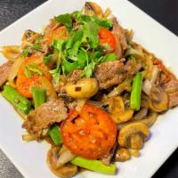Beef Mushroom-Special · Stir-fried beef with mushroom, white onion, green onions, tomatoes, black pepper, and cilant...