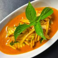 Red Curry · Bamboo shoots, zucchini, and basil leaves in red curry sauce.