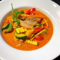 Duck Curry--Special · Duck meat in red curry  with bell peppers, carrot, basil, zucchini, pineapples, tomatoes, an...