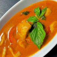 Gaeng Plah · Tender chunks of boneless fish cooked in red curry, bell peppers, and basil leave.