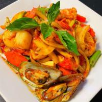 Spicy Combination Seafood · Stir-fried in a spicy sauce with onion, celery, bell pepper, basil, carrot, shrimp, scallops...