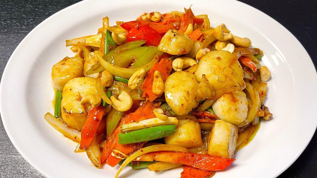 Scallops With Cashews · Stir-fried scallops with celery, onions, bell papers, cashews, and carrots in spicy chili sauce.