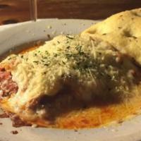 Lasagna · bonfiglio family recipe with italian sausage, mozzarella, ricotta, ragu and parmesan.