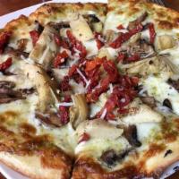 Small Pesto Pizza · our own pesto sauce, mozzarella, fresh mushrooms, artichoke hearts and sun-dried tomatoes, t...