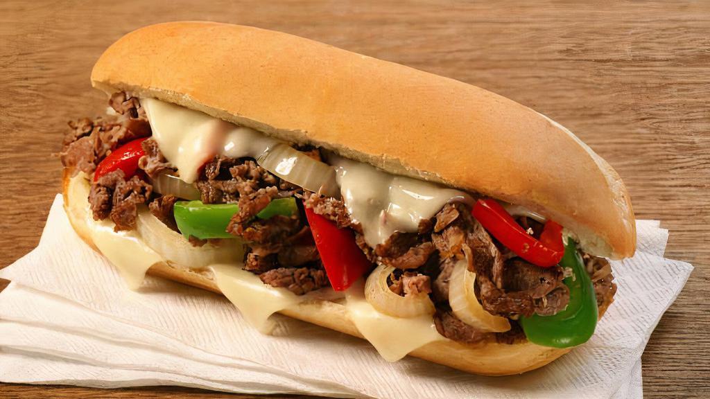 Philly Cheesesteak · Brisket, grilled onion, bell peppers, Cheddar cheese melted on your choice of bread.