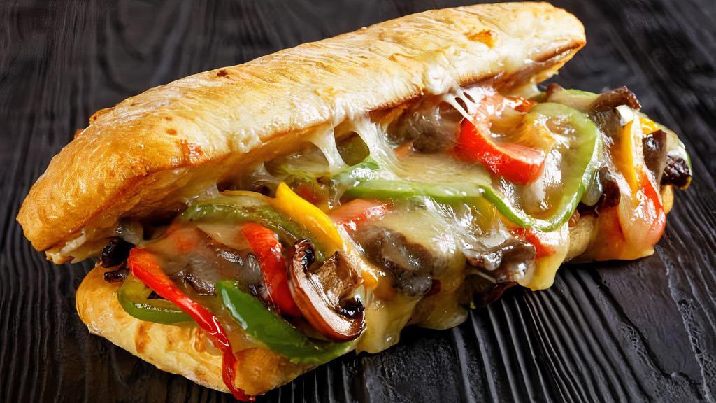 Veggie Cheesesteak · Grilled onion, peppers, mushrooms, swiss cheese melted onto your choice of bread.