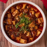 Ma Pao Tofu With Pork · Hot and spicy. Spicy hot! Bean curd sautéed with minced pork, highly seasoned with garlic an...