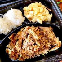 Kalua Pulled Pork Plate · Eight-hour slow roasted pork roast, pulled and seasoned, served with two scoops of rice and ...