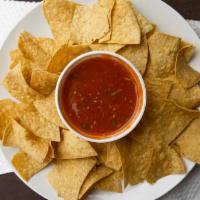 Chips & Salsa · Corn tortillas chips served with our special salsa.