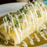 Arizona Burrito · Tender slow-cooked green chile pork. Topped with homemade green tomatillo sauce, melted Oaxa...