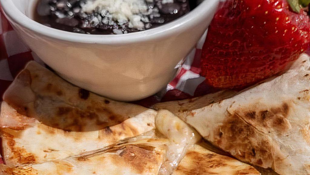 Cheese Quesadilla Kids · Oaxaca cheese quesadilla.. Side choice of either Barrio fries, black beans, mixed fruit, rice or veggies.