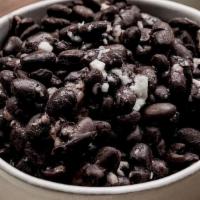Black Beans Side · Our homemade epazote black beans.