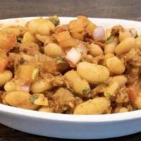 Charro Beans Side · Peruano beans stewed with chorizo and pico de gallo.