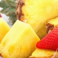 Fruit Mixed Side · Strawberries and pineapple, freshly cut and mixed.