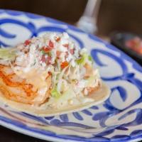 Camaron Asado Taco · Marinated grilled shrimp. . Topped with red cabbage, homemade pico de gallo, queso fresco an...