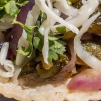 Rajas Taco · Roasted poblano peppers and sauteed red onions. . Topped with fresh cilantro and Oaxaca chee...