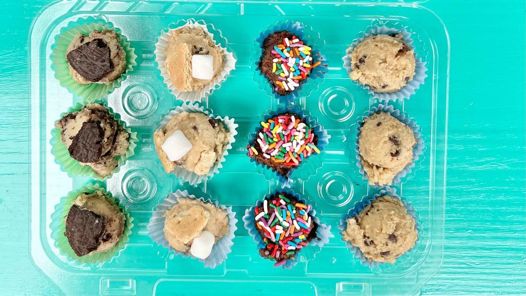 Cookie Dough Bites Box · THESE ARE PREMADE IN OUR GRAB AND GO AND NO SUBSTITUTIONS WILL BE MADE.
12 Cookie Dough Bites - 3 Confetti w/sprinkles, 3 Brownie batter w/Oreo crumb, 3 Oat chocolate chip, 3 Chocolate chip.
