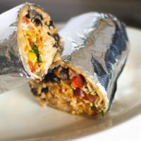 Burrito · Large flour tortilla rolled with rice, beans, your choice of meat and your choice of veggies.