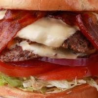 Chuck Burger · 6 ounce Creekstone fresh burger with lettuce, tomato, pickle, onion topped with crisp bacon ...