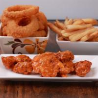 Boneless Wings - 6 Pieces · (6) Large all white meat Boneless Wings. Served with a side of Ranch.  Choice of: Naked, Hon...