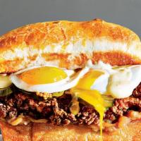 New!: Crispy Chicken & Egg Sandwich · Crispy battered chicken breast topped with a fried egg, melted white American cheese, bomb s...