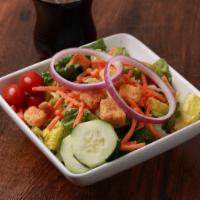 Side Kick Salad · Romaine, tomatoes, red onions, cucumbers, croutons, and shredded carrots.
