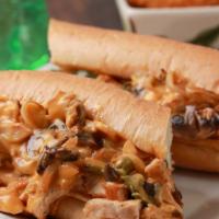 Chicken Philly · Grilled chicken, green peppers, mushrooms, grilled onions and Whiz.