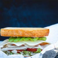 Philly Bird Sandwich · Turkey, avocado, white American cheese, lettuce, tomato, mayo on sourdough bread.