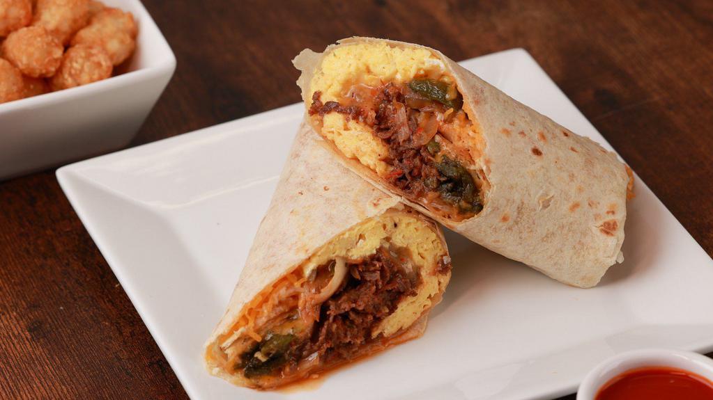 Ct Crunch Breakfast Burrito  · Eggs, ribeye steak, sauteed onions, poblano peppers, mushrooms with a spicy salsa roja and shredded cheddar jack cheese rolled in a flour tortilla wrap. Served with hot sauce.
