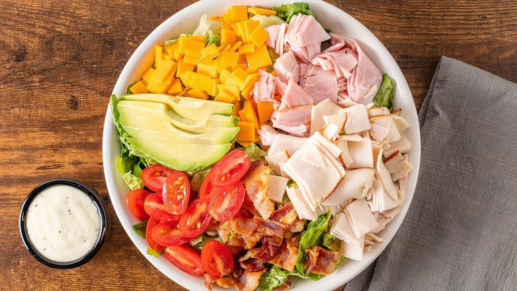 Chef Salad · Romaine, roasted turkey, smoked ham, crisp bacon, avocado, grape tomato, cheddar cheese. Try it with ranch dressing.