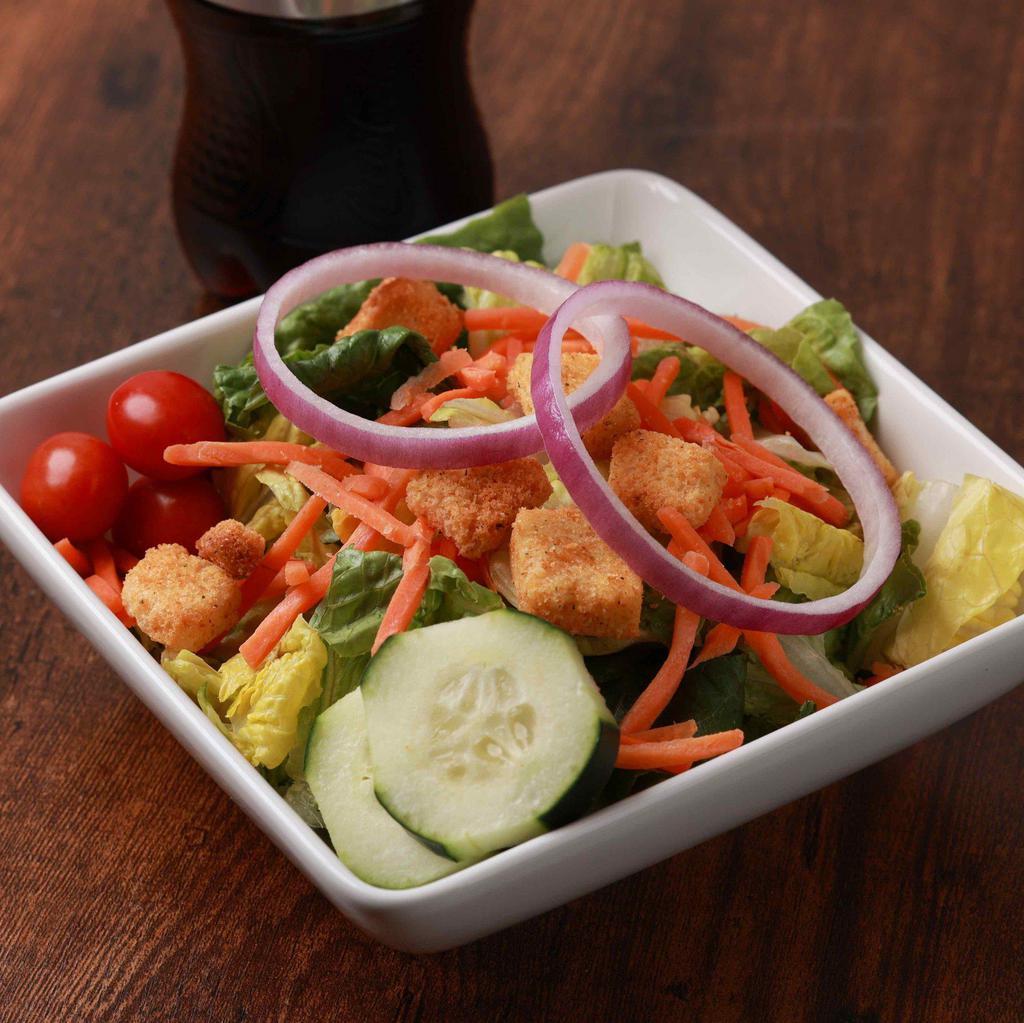 Side Kick Salad · Romaine, grape tomatoes, red onions, cucumbers, shredded carrots, and croutons. Served with your choice of Dressing.